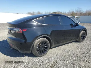 2023 Tesla Model Y Long Range with VIN 7SAYGDEE5PF892285, listed as a Copart auction lot 46458635 with 39,951 mi miles and Salvage Title. Bid and sale history available at DreamBid. Image 3.