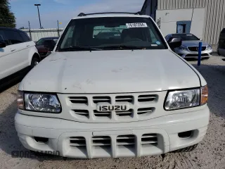 2002 Isuzu Rodeo S z VIN 4S2CK58W424342189, wystawiony jako Copart lot #76187294 z przebiegiem 139 827 mil mil oraz Szkody całkowita. Historia ofert i sprzedaży dostępna na DreamBid. Obrazek 5.