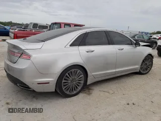 2014 Lincoln MKZ z VIN 3LN6L2JK3ER813137, wystawiony jako Copart lot #48230835 z przebiegiem 135 538 mil mil oraz Czysty tytuł • Clean title. Historia ofert i sprzedaży dostępna na DreamBid. Obrazek 3.