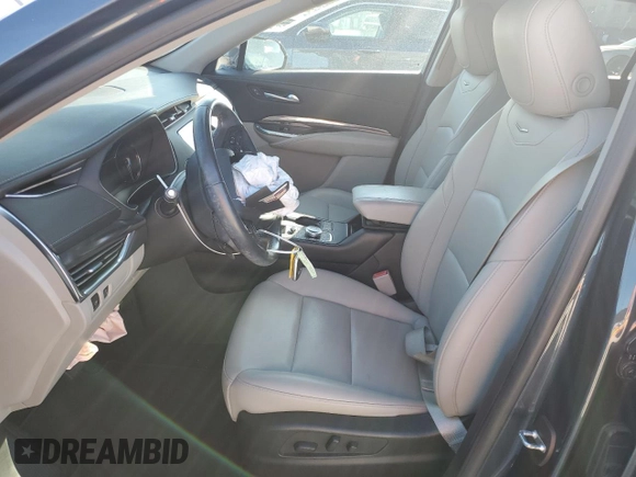 2019 Cadillac XT4 FWD Luxury z VIN 1GYAZAR49KF103014, wystawiony jako Copart lot #46892155 z przebiegiem 27 915 mil mil oraz Szkoda całkowita • Salvage title. Historia ofert i sprzedaży dostępna na DreamBid. Obrazek 7.