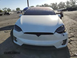 2021 Tesla Model X Long Range Plus with VIN 5YJXCBE22MF311576, listed as a Copart auction lot 68583984 with 83,137 mi miles and Salvage Title. Bid and sale history available at carsss.com. Image 5.