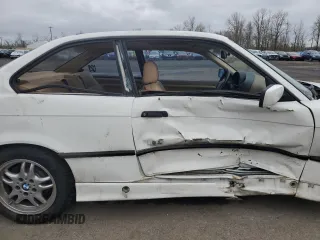 1997 BMW 3 Series 328is with VIN WBABG132XVET04869, listed as a Copart auction lot 45774015 with 123,280 mi miles and Salvage Title. Bid and sale history available at carsss.com. Image 10.