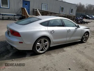 2015 Audi S7 with VIN WAUW2AFC8FN023143, listed as a Copart auction lot 49879934 with 67,651 mi miles. Bid and sale history available at carsss.com. Image 3.