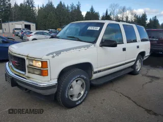 1997 GMC Yukon with VIN 1GKEK13R5VJ762200, listed as a Copart auction lot 47579745 with 165,573 mi miles and Clean Title. Bid and sale history available at carsss.com. Image 1.