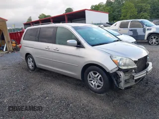 2006 Honda Odyssey EX z VIN 5FNRL38406B403736, wystawiony jako IAAI lot #42288117 z przebiegiem 159 686 mil mil oraz . Historia ofert i sprzedaży dostępna na DreamBid. Obrazek 1.