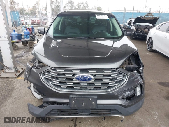 2020 Ford Edge SEL z VIN 2FMPK3J95LBA27779, wystawiony jako IAAI lot #42139536 z przebiegiem 58 285 mil mil oraz . Historia ofert i sprzedaży dostępna na DreamBid. Obrazek 13.