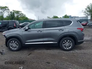 2019 Hyundai Santa Fe SEL z VIN 5NMS3CAD7KH035429, wystawiony jako IAAI lot #42323641 z przebiegiem 60 909 mil mil oraz . Historia ofert i sprzedaży dostępna na DreamBid. Obrazek 15.
