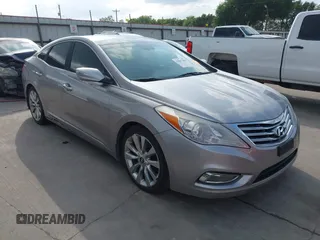 2013 Hyundai Azera with VIN KMHFH4JGXDA203303, listed as a IAAI auction lot 42097589 with 118,599 mi miles and . Bid and sale history available at DreamBid. Image 1.