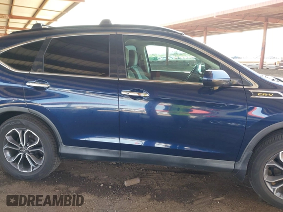 2015 Honda CR-V EX with VIN 2HKRM3H5XFH512244, listed as a IAAI auction lot 41950357 with 124,005 mi miles and . Bid and sale history available at carsss.com. Image 13.