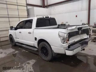 2018 Nissan Titan SV with VIN 1N6AA1E63JN539220, listed as a IAAI auction lot 41487109 with 122,144 mi miles. Bid and sale history available at carsss.com. Image 3.
