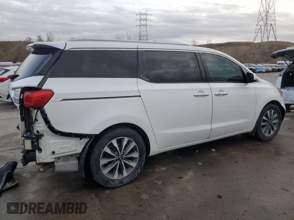 2015 Kia Sedona SX with VIN KNDMC5C19F6032915, listed as a Copart auction lot 82626784 with 135,594 mi miles and Salvage Title. Bid and sale history available at carsss.com. Image 3.