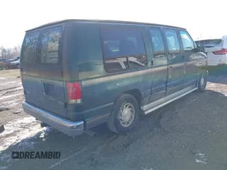 1999 Ford Econoline Cargo with VIN 1FDRE14W3XHB36482, listed as a IAAI auction lot 41393346 with 130,669 mi miles. Bid and sale history available at carsss.com. Image 4.