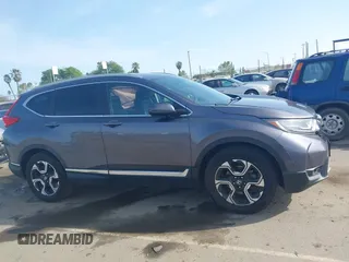 2018 Honda CR-V Touring with VIN 7FARW1H93JE027294, listed as a IAAI auction lot 41903484 with 80,999 mi miles and . Bid and sale history available at DreamBid. Image 14.