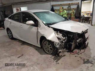 2021 Toyota Prius LE z VIN JTDL9MFU9M3027349, wystawiony jako IAAI lot #41334415 z przebiegiem 93 089 mil mil oraz . Historia ofert i sprzedaży dostępna na DreamBid. Obrazek 1.