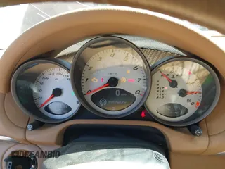 2005 Porsche Boxster S z VIN WP0CB29865U731351, wystawiony jako IAAI lot #42153541 z przebiegiem 97 378 mil mil oraz . Historia ofert i sprzedaży dostępna na DreamBid. Obrazek 7.