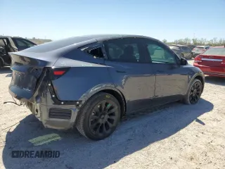 2023 Tesla Model Y Long Range z VIN 7SAYGDEE8PA185193, wystawiony jako Copart lot #48706215 z przebiegiem 10 451 mil mil oraz Szkoda całkowita • Salvage title. Historia ofert i sprzedaży dostępna na DreamBid. Obrazek 3.