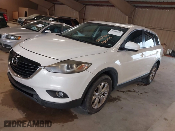 2014 Mazda CX-9 Touring with VIN JM3TB2CA8E0430199, listed as a IAAI auction lot 42090612 with 188,412 mi miles and . Bid and sale history available at carsss.com. Image 2.
