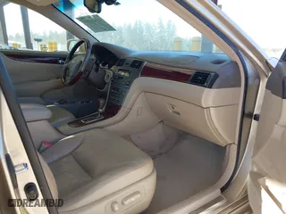 2004 Lexus ES 330 with VIN JTHBA30G340003869, listed as a IAAI auction lot 42024907 with 240,425 mi miles. Bid and sale history available at carsss.com. Image 5.