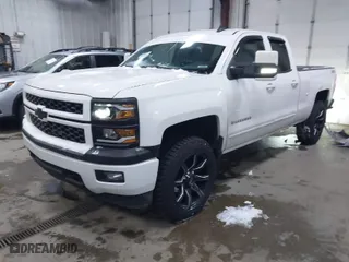 2015 Chevrolet Silverado 1500 LT with VIN 1GCVKREC1FZ225653, listed as a IAAI auction lot 41514814 with 133,468 mi miles. Bid and sale history available at carsss.com. Image 2.