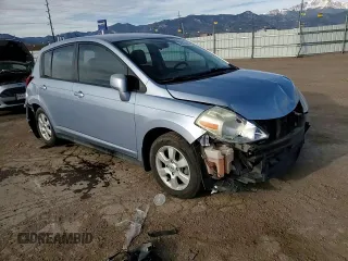 2009 Nissan Versa SL z VIN 3N1BC13E39L395999, wystawiony jako Copart lot #50225605 z przebiegiem 183 206 mil mil oraz Szkoda całkowita • Salvage title. Historia ofert i sprzedaży dostępna na DreamBid. Obrazek 10.