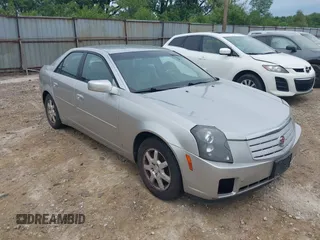 2006 Cadillac CTS z VIN 1G6DM57T360187345, wystawiony jako IAAI lot #42450357 z przebiegiem 144 666 mil mil oraz . Historia ofert i sprzedaży dostępna na DreamBid. Obrazek 1.