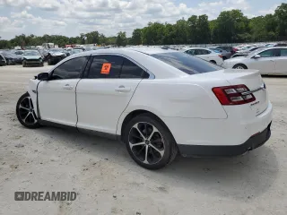2016 Ford Taurus SEL z VIN 1FAHP2E86GG138691, wystawiony jako Copart lot #57495575 z przebiegiem Nie podano mil oraz Szkoda całkowita • Salvage title. Historia ofert i sprzedaży dostępna na DreamBid. Obrazek 2.