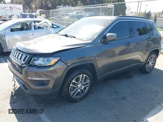 2020 Jeep Compass Latitude with VIN 3C4NJCBB9LT252792, listed as a IAAI auction lot 41714320 with 53,018 mi miles and . Bid and sale history available at DreamBid. Image 2.