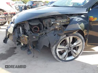 2013 Hyundai Veloster w/Black Int with VIN KMHTC6AD2DU171044, listed as a IAAI auction lot 42245907 with 140,542 mi miles and . Bid and sale history available at DreamBid. Image 6.