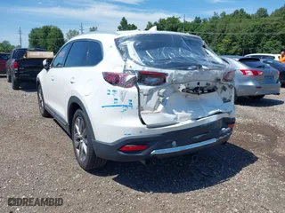 2016 Mazda CX-9 Grand Touring with VIN JM3TCBDY7G0125708, listed as a IAAI auction lot 39891843 with 133,988 mi miles. Bid and sale history available at carsss.com. Image 6.