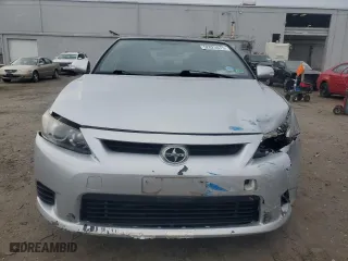 2013 Scion tC with VIN JTKJF5C79D3063104, listed as a Copart auction lot 52823475 with 107,358 mi miles and Salvage Title. Bid and sale history available at carsss.com. Image 5.