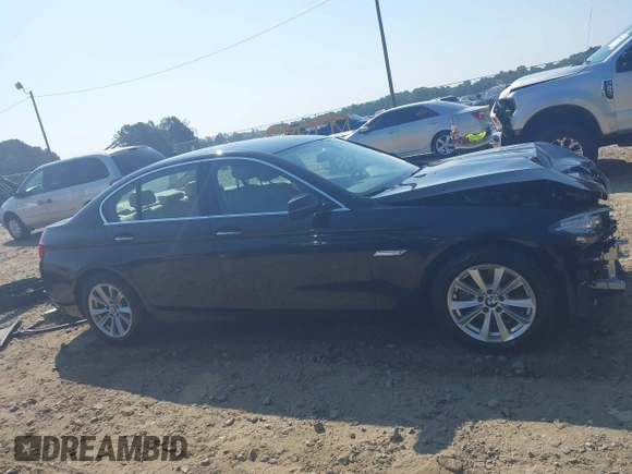 2015 BMW 5 Series 528i with VIN WBA5A5C52FD518794, listed as a IAAI auction lot 42571091 with 165,744 mi miles and . Bid and sale history available at DreamBid. Image 14.