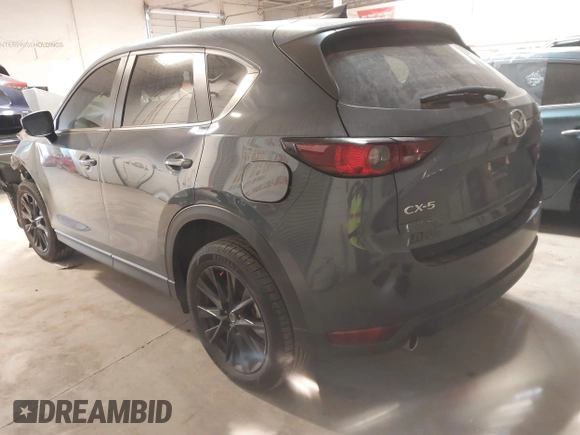 2021 Mazda CX-5 Touring with VIN JM3KFACM9M0379508, listed as a IAAI auction lot 41577251 with 46,519 mi miles. Bid and sale history available at carsss.com. Image 3.