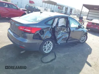 2017 Ford Focus SE with VIN 1FADP3F2XHL312253, listed as a IAAI auction lot 41480167 with 86,459 mi miles. Bid and sale history available at carsss.com. Image 4.