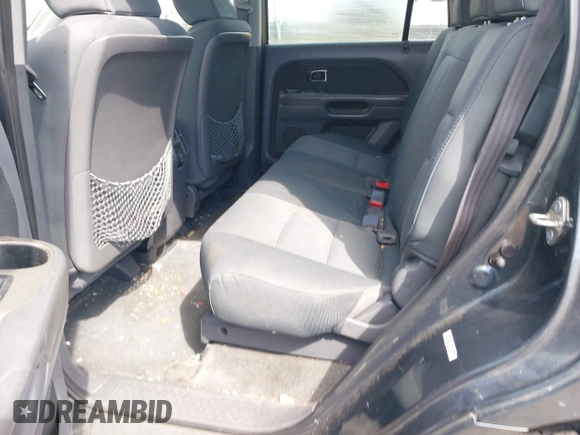 2006 Honda Pilot LX with VIN 2HKYF18146H556070, listed as a IAAI auction lot 42011915 with 145,112 mi miles and . Bid and sale history available at DreamBid. Image 8.