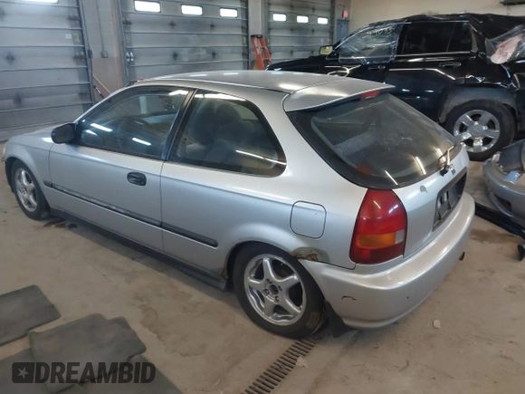 1998 Honda Civic DX with VIN 2HGEJ6342WH101132, listed as a IAAI auction lot 41253094 with 179,169 mi miles. Bid and sale history available at carsss.com. Image 3.
