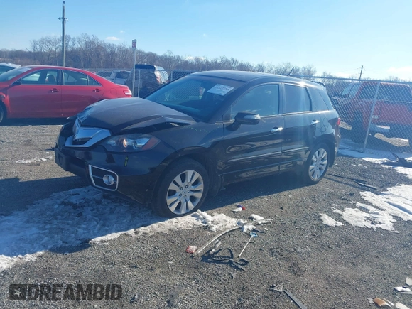 2010 Acura RDX with VIN 5J8TB1H29AA006461, listed as a IAAI auction lot 41321754 with 165,000 mi miles. Bid and sale history available at carsss.com. Image 2.