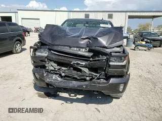 2016 Chevrolet Silverado 1500 LTZ with VIN 3GCUKSEJ3GG191945, listed as a Copart auction lot 71948494 with 143,055 mi miles and Salvage Title. Bid and sale history available at DreamBid. Image 11.