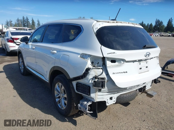 2019 Hyundai Santa Fe SE with VIN 5NMS2CAD0KH098259, listed as a IAAI auction lot 42075356 with 55,163 mi miles and . Bid and sale history available at DreamBid. Image 3.
