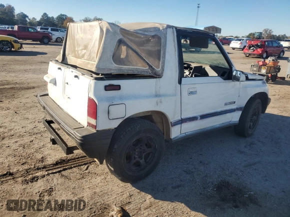 1990 Geo Tracker z VIN 2CNBJ18UXL6217744, wystawiony jako Copart lot #84203244 z przebiegiem 23 221 mil mil oraz Szkody całkowita. Historia ofert i sprzedaży dostępna na DreamBid. Obrazek 3.
