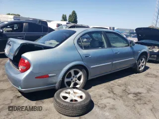 2000 Nissan Maxima GXE z VIN JN1CA31D9YT543874, wystawiony jako Copart lot #69275784 z przebiegiem 214 833 mil mil oraz Szkoda całkowita • Salvage title. Historia ofert i sprzedaży dostępna na DreamBid. Obrazek 3.