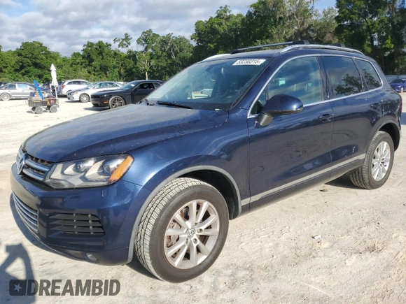 2014 Volkswagen Touareg Sport with VIN WVGEF9BP0ED005648, listed as a Copart auction lot 53230315 with 188,103 mi miles and Clean Title. Bid and sale history available at DreamBid. Image 1.