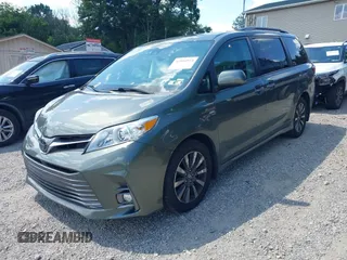 2018 Toyota Sienna XLE with VIN 5TDDZ3DC4JS189540, listed as a IAAI auction lot 42594973 with 103,374 mi miles and . Bid and sale history available at DreamBid. Image 2.