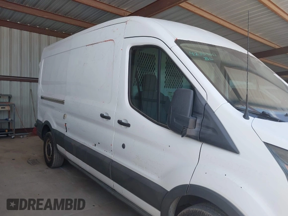 2016 Ford Transit Cargo with VIN 1FTBW2CM0GKA68198, listed as a IAAI auction lot 42709011 with 187,802 mi miles and . Bid and sale history available at DreamBid. Image 14.