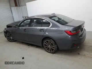 2019 BMW 3 Series 330i with VIN WBA5R1C56KFH04731, listed as a Copart auction lot 56854405 with 99,999 mi miles and Clean title. Bid and sale history available at DreamBid. Image 2.