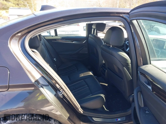 2019 BMW 5 Series 530i xDrive with VIN WBAJA7C50KWW05263, listed as a IAAI auction lot 41571583 with 71,185 mi miles and . Bid and sale history available at DreamBid. Image 8.