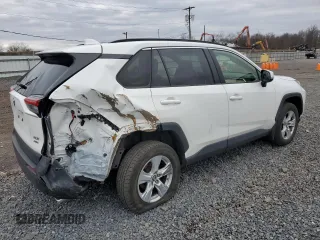 2019 Toyota RAV4 XLE with VIN JTMP1RFV9KD506344, listed as a Copart auction lot 47898145 with 100,718 mi miles and Salvage Title. Bid and sale history available at DreamBid. Image 3.