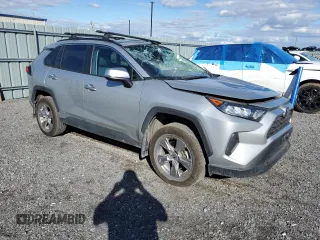2023 Toyota RAV4 Hybrid XLE Premium with VIN 2T3BWRFV1PW157475, listed as a Copart auction lot 73371224 with 52,412 mi miles and Salvage title. Bid and sale history available at DreamBid. Image 4.