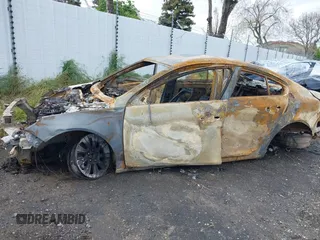 2013 Buick Regal Premium 1 z VIN 2G4GS5ER9D9211511, wystawiony jako IAAI lot #41799276 z przebiegiem Nie podano mil oraz . Historia ofert i sprzedaży dostępna na DreamBid. Obrazek 13.