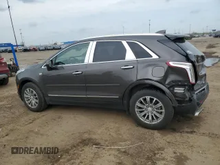 2019 Cadillac XT5 Luxury FWD with VIN 1GYKNCRSXKZ132871, listed as a Copart auction lot 54879405 with 57,325 mi miles and Salvage title. Bid and sale history available at DreamBid. Image 2.