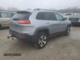 2014 Jeep Cherokee Trailhawk with VIN 1C4PJMBS1EW240177, listed as a Copart auction lot 43321715 with 212,339 mi miles and Salvage title. Bid and sale history available at DreamBid. Image 3.
